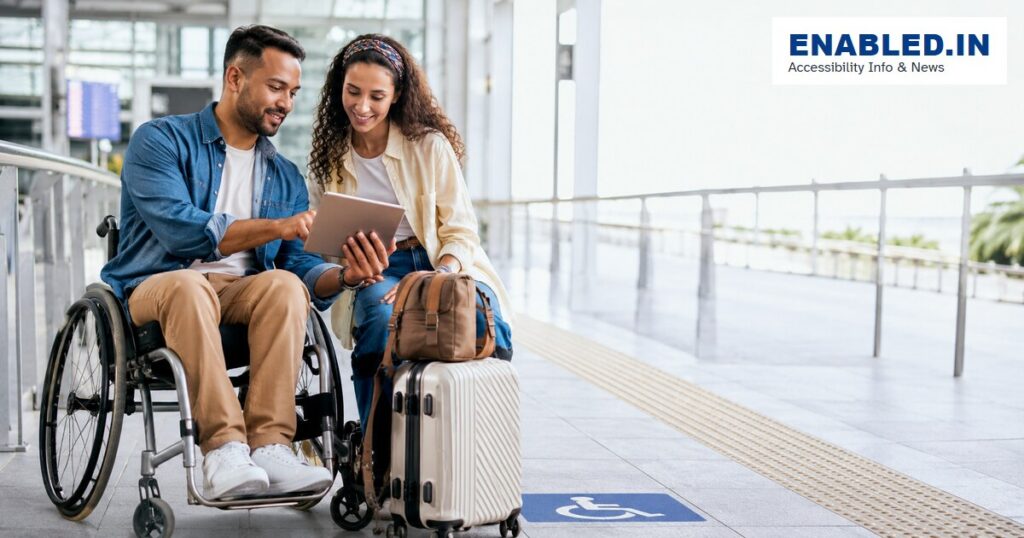 Wheelchair user and companion reviewing an accessible travel plan at a step-free transport hub