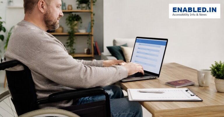 Wheelchair user completing an accessible online visa application at home